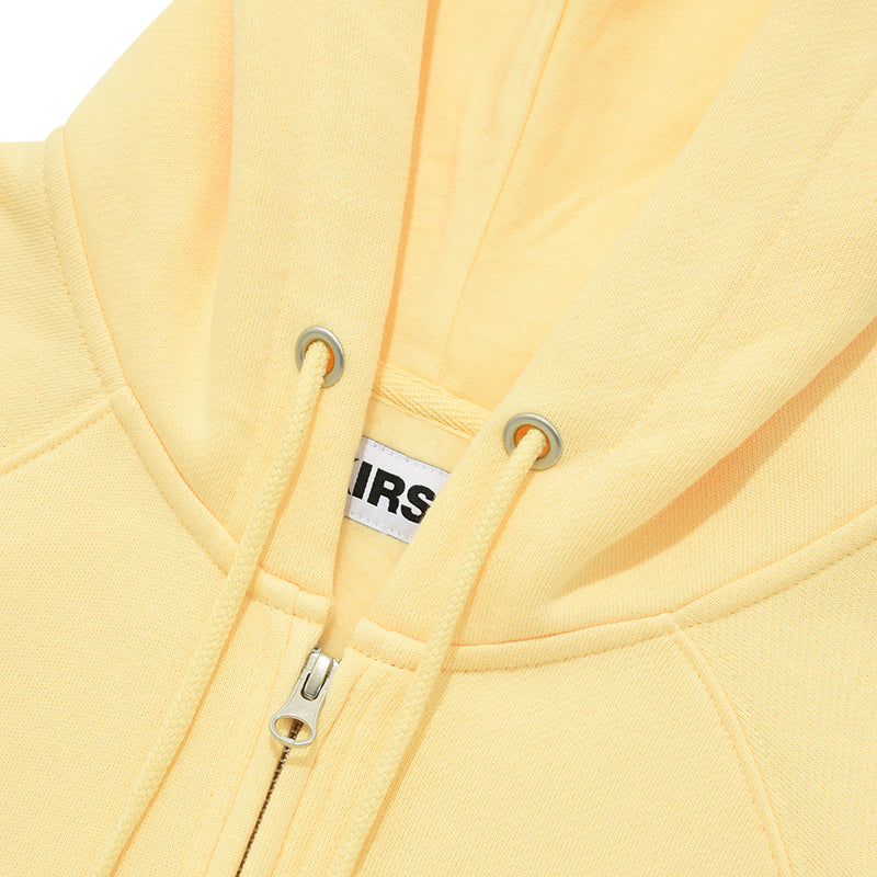 ドゥードゥルチェリーサークルロゴナッピングフーディージップジップアップ【ライトイエロー】