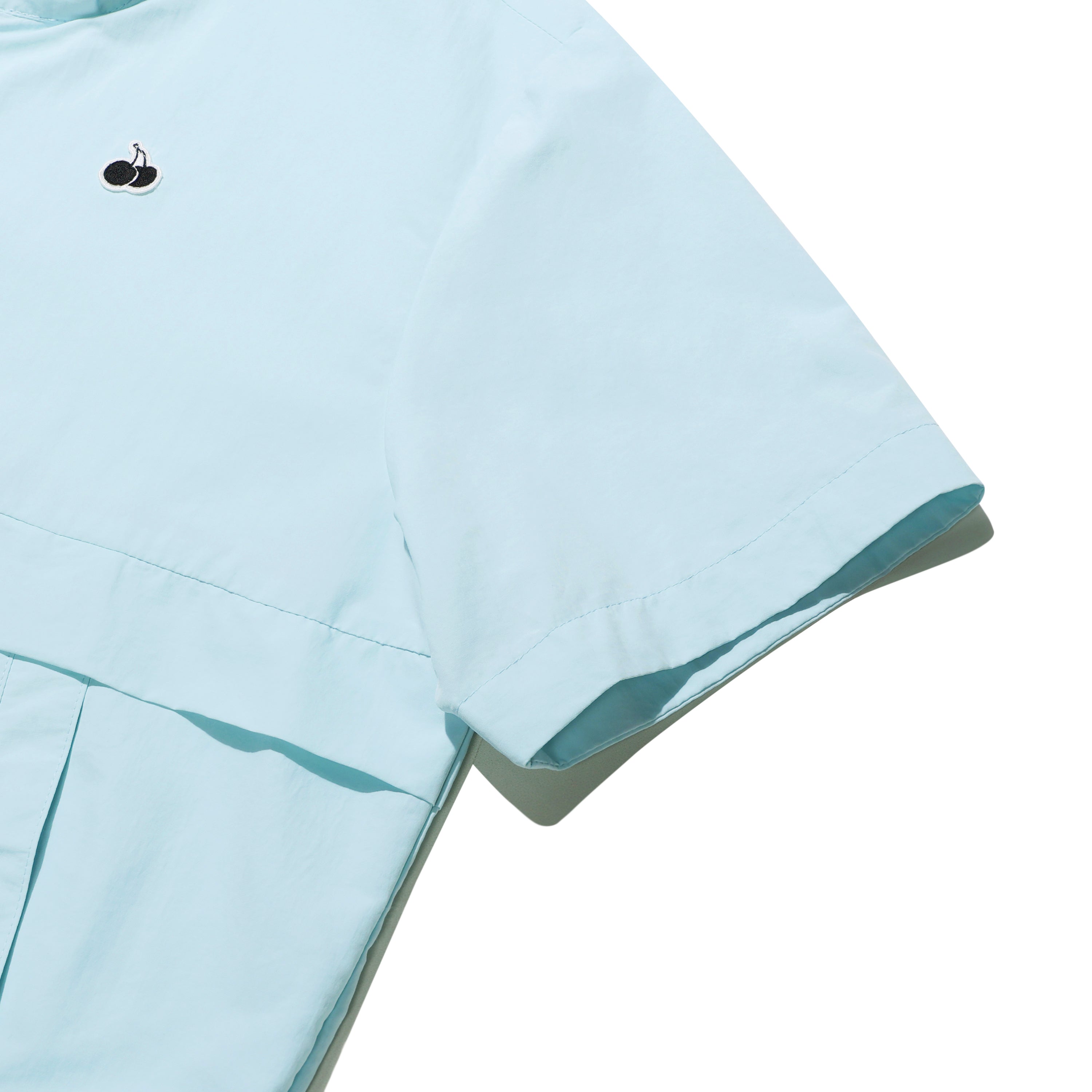 UNI モノチェリーハーフジップアップアノラック【アイス】